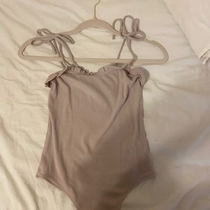 Ruffled mauve bodysuit